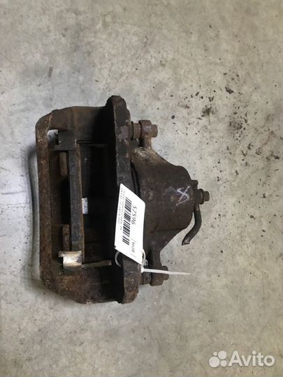 Суппорт тормозной передний левый Kia Soul 2.0 I