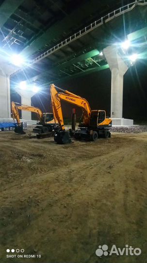 Машинист колесного экскаватора