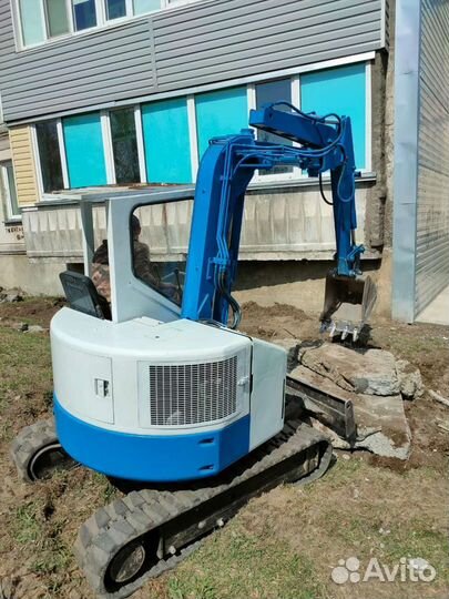 Услуга миниэксковатора