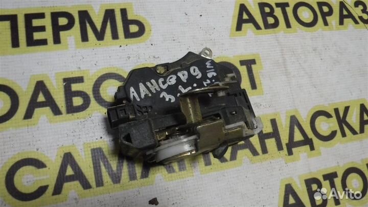 Замок двери задней левой Mitsubishi Lancer 9 (CS)