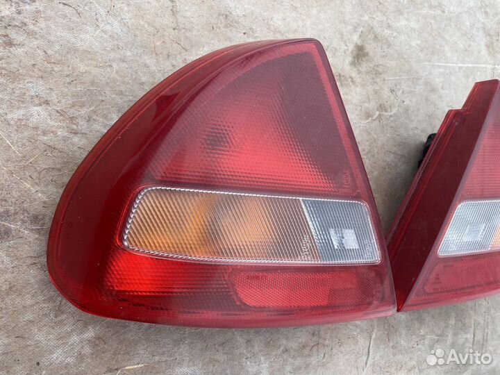 Фонарь левый правый Mitsubishi Lancer 6 Лансер VI