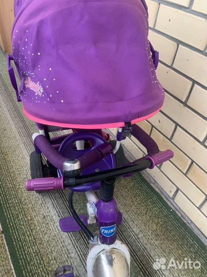 Трехколесный велосипед с ручкой