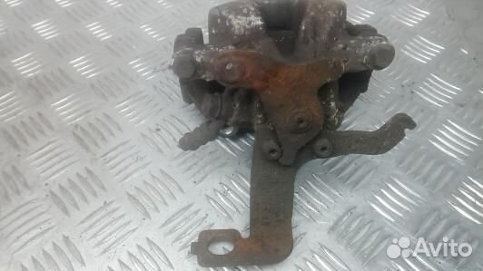 Суппорт тормозной задний правый toyota avensis T27 (6GM20OO01)