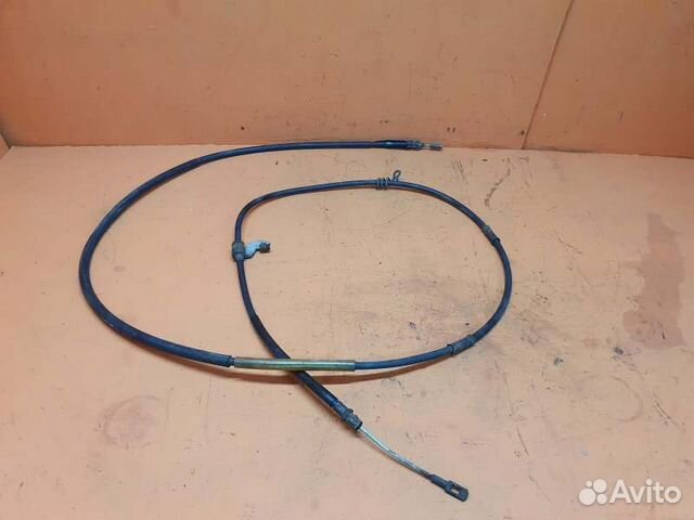 Трос стояночного тормоза задний правый Ford