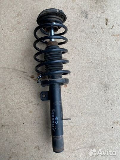 Стойка подвески передняя левая Citroen C3