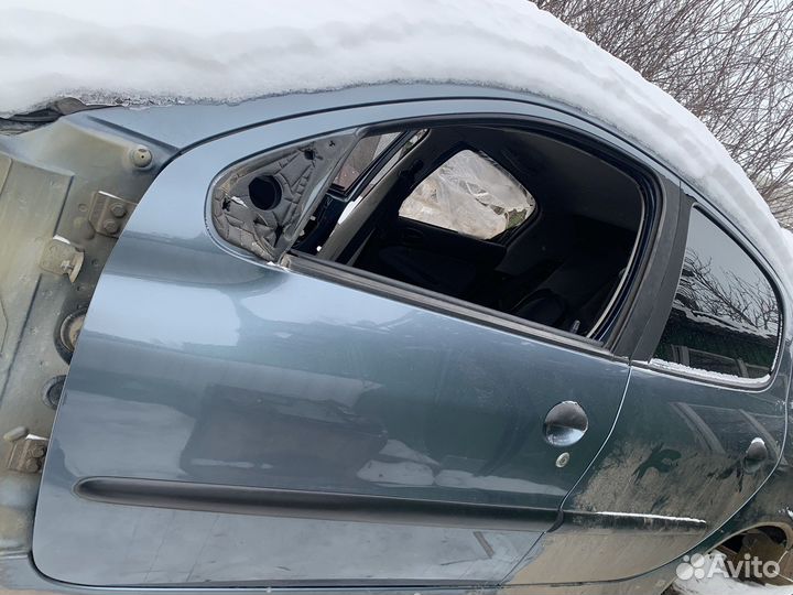 Дверь Peugeot 206