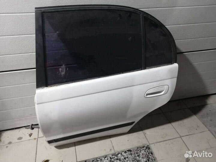 Задняя левая дверь toyota corona st190