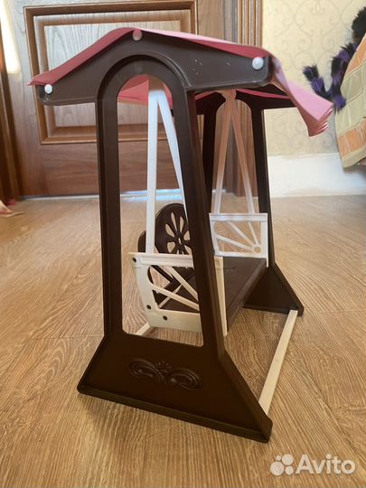 Игрушечная качель