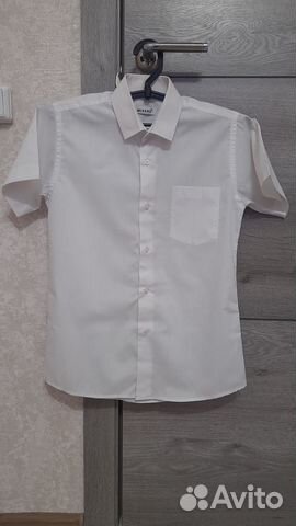 Рубашка с коротким рукавом,длина по спинке 66 см