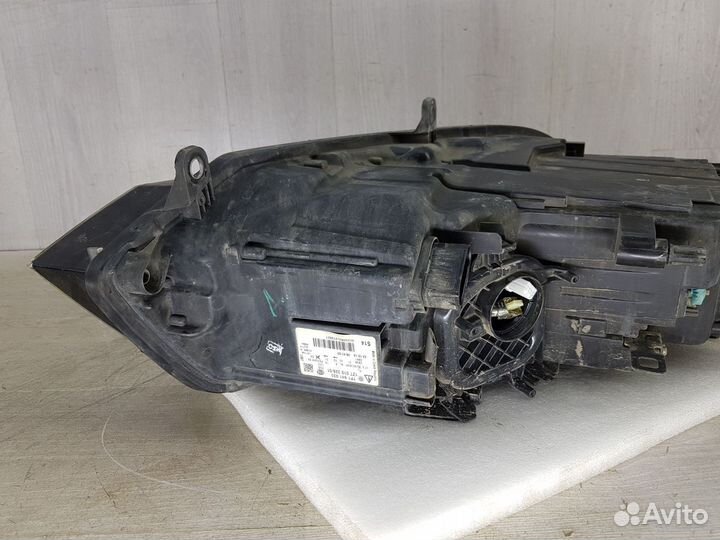 Фара левая Volkswagen Touareg