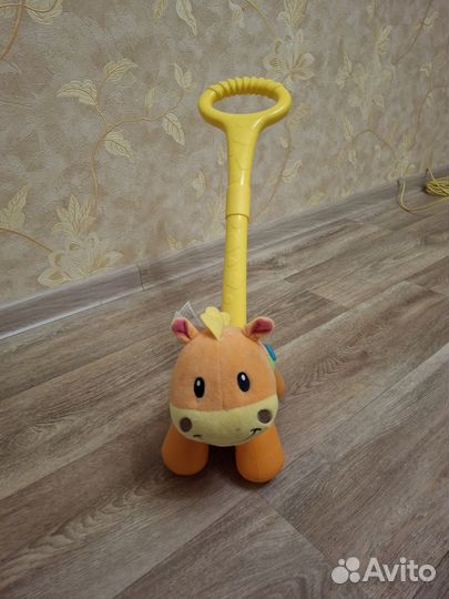 Игрушка каталка с ручкой
