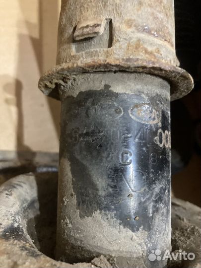 Стойка с пружиной передняя солярис