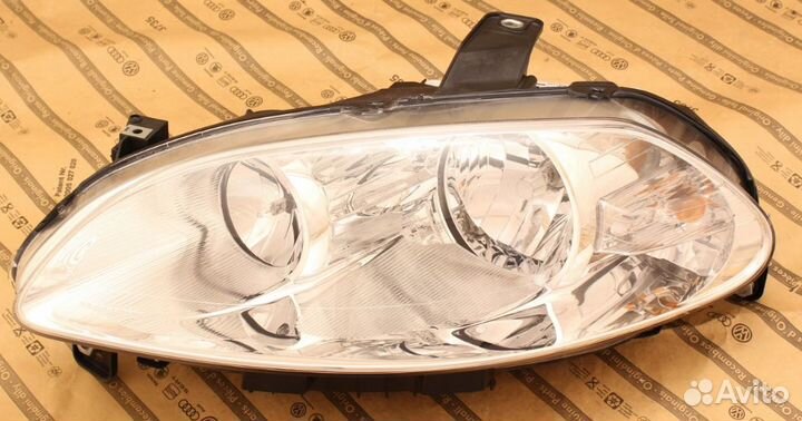 Фара левая fiat croma 2 II 05-07