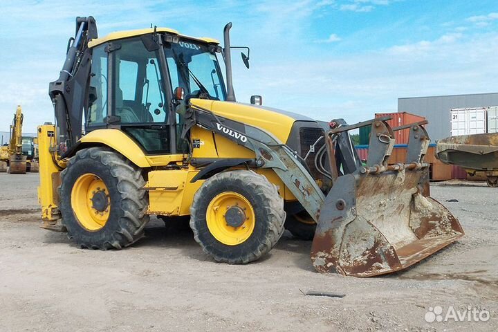 Аренда экскаватора-погрузчика услуги трактора