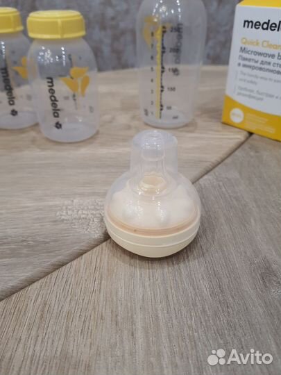 Смартсоска Medela Calma, бутылочки для кормления