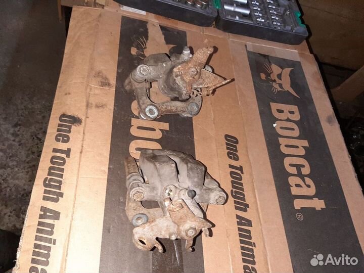 Суппорт тормозной задний Renault Fluence Меган 3