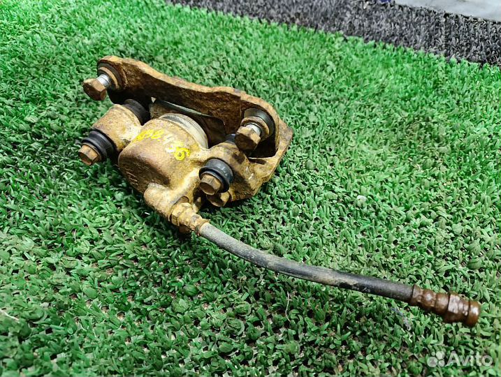 Суппорт тормозной задний правый Mitsubishi Pajero Sport