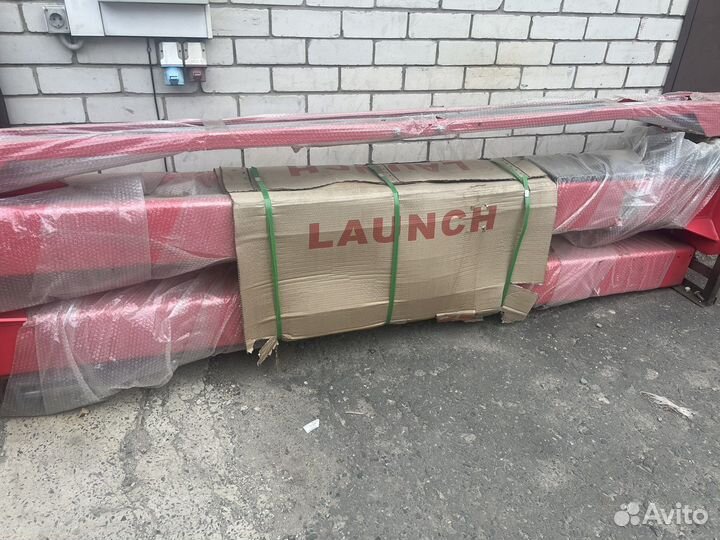 Подъемник автомобильный электрогидравлический