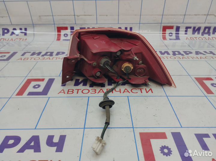 Фонарь задний наружный левый Mitsubishi Lancer X