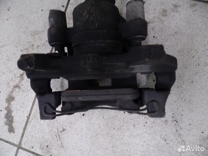 Суппорт тормозной передний правый Renault Sandero