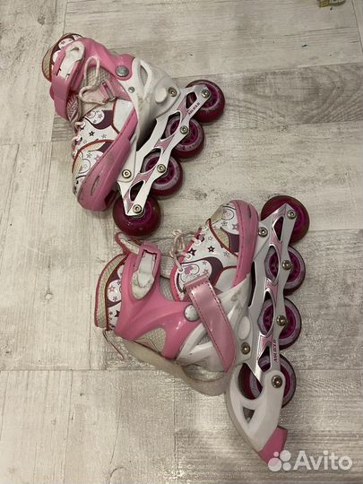 Роликовые коньки