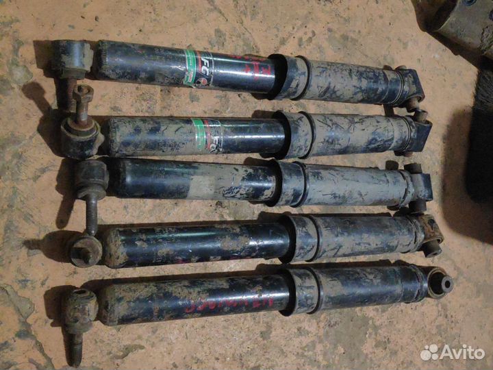 Задний амортизатор Renault Megan 2