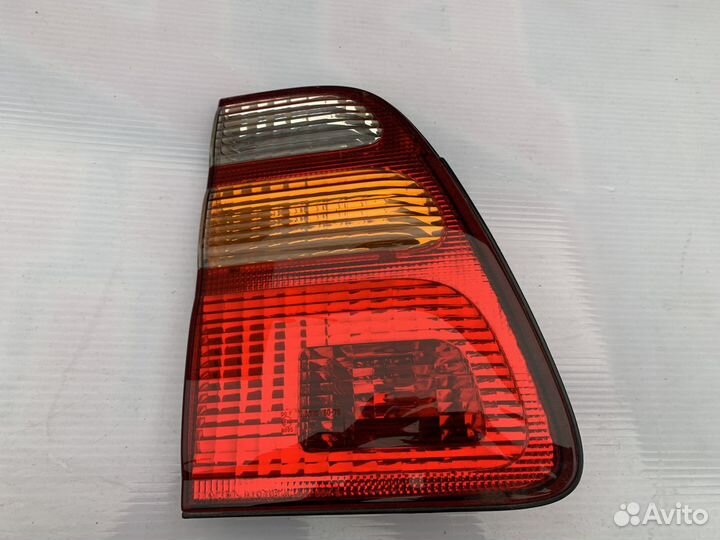 Фонарь левый внутренний Land Cruiser 100