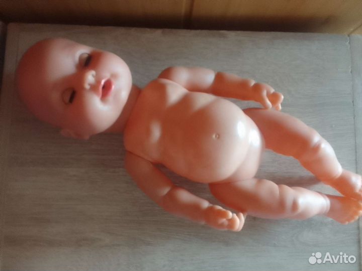 Пупс в коляске