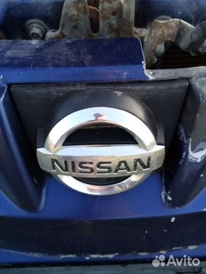 Эмблема Nissan Wingroad Y11