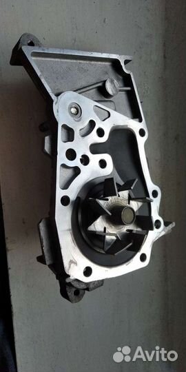 Помпа Логан,Сандеро 1 поколения К7М двигатель