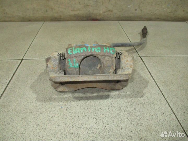 Суппорт задний левый Hyundai Elantra 4 (HD)