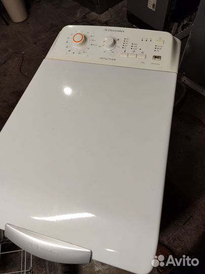 Стиральная машина с вертикальной загрузкой