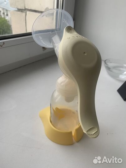 Молокоотсос medela ручной