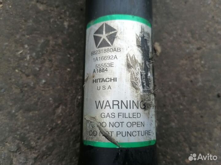 Стойка амортизатора передняя Jeep Grand Cherokee 4