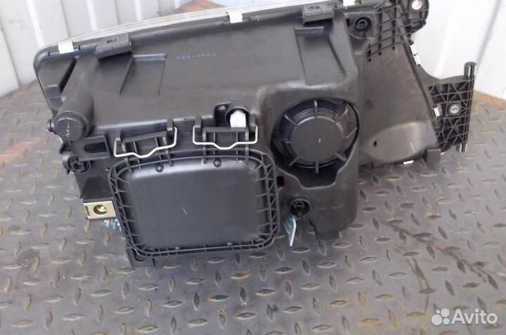 Фара левая MAN TGX TGS 4491102lmldem