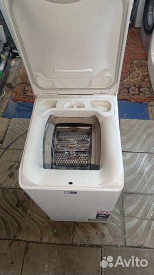 Стиральная машина с вертикальной загрузкой
