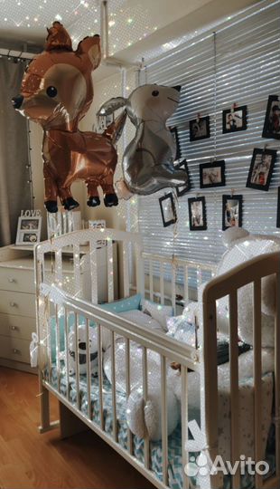 Детская кроватка с маятником