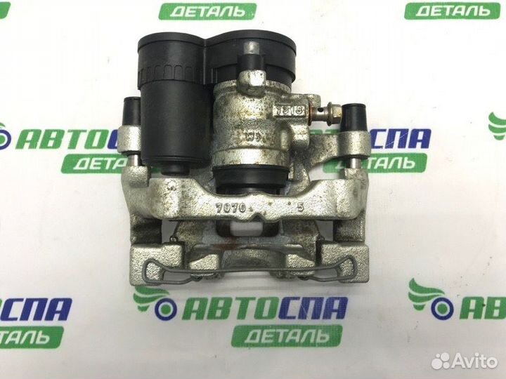 Суппорт тормозной задний правый Mazda 3 BP PE / P5