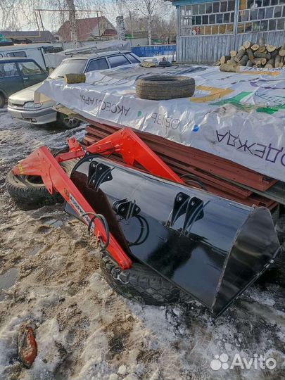 Новый кун на мтз 80 с ковшом