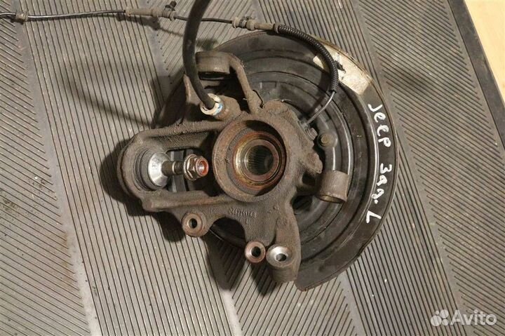 Кулак поворотный задний левый Jeep Grand Cherokee