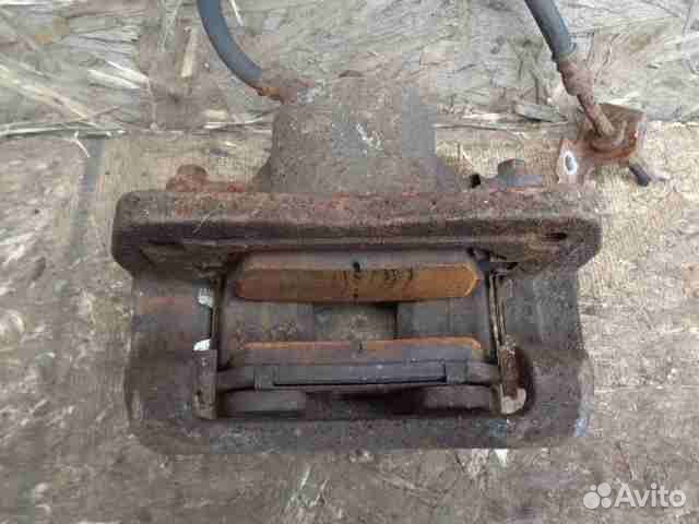 Суппорт передний правый Kia Sorento 2 XM