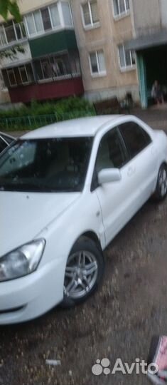 Mitsubishi Lancer 1.3 МТ, 2005, 176 000 км