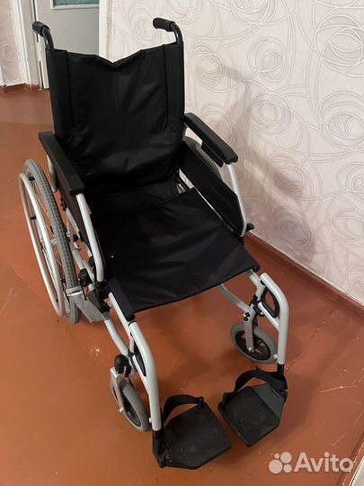 Инвалидная коляска
