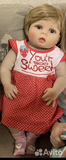 Кукла реборн 55 см + пакет вещей