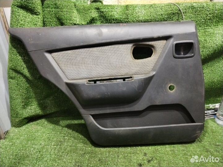 Обшивка боковой двери задняя левая Daewoo Nexia