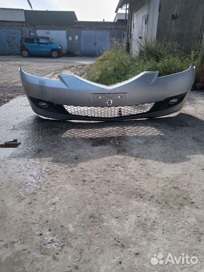 Бампер передний Mazda Axela