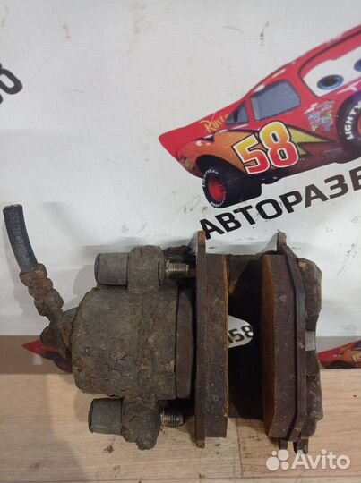 Суппорт тормозной передний правый Skoda Fabia