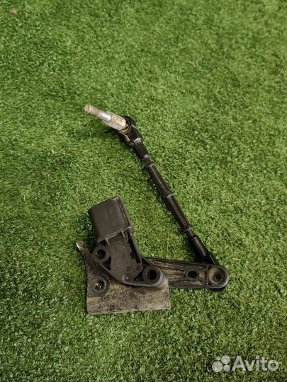 Датчик высоты подъема задний левый Volkswagen