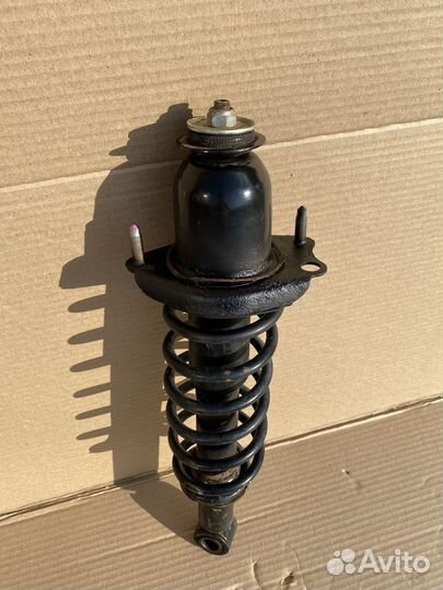 Амортизатор задний Toyota Corolla 120