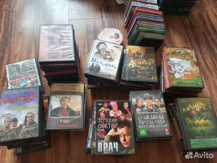 DVD диски с фильмами и мультфильмами пакетом